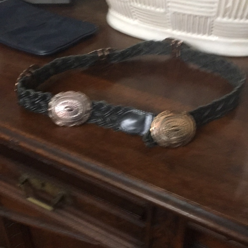 Leather belt with silver buckles.